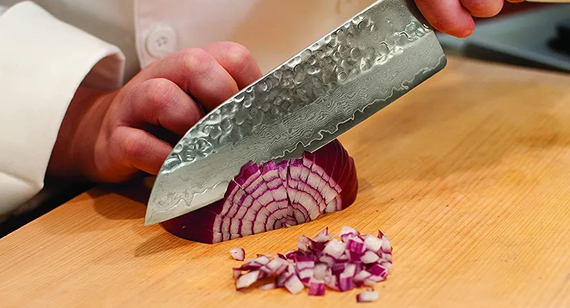 Testing the sharpness of steel knives