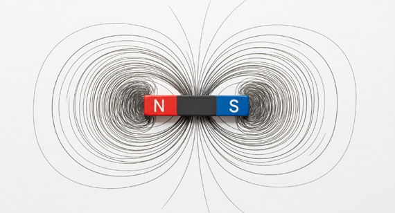 Magnet attracts iron filings