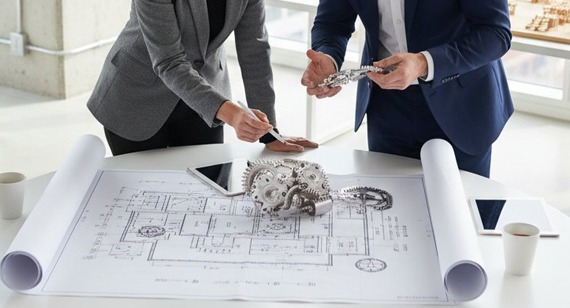 engineer client office discussion tin prototype machining parts drawing design